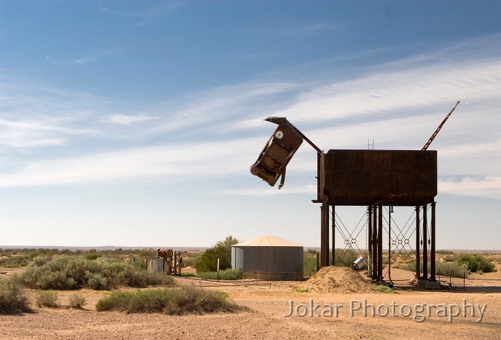 Lake Eyre (Day 2)_20070407_049.jpg - Water tower sculpture (the head is an old Valiant car), Alberrie, Oodnadatta Track, SA